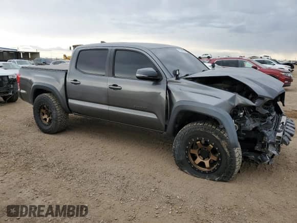 2017 Toyota Tacoma SR5 z VIN 3TMCZ5AN9HM104442, wystawiony jako Copart lot #81242535 z przebiegiem 95 090 mil mil oraz Szkoda całkowita • Salvage title. Historia ofert i sprzedaży dostępna na DreamBid. Obrazek 4.