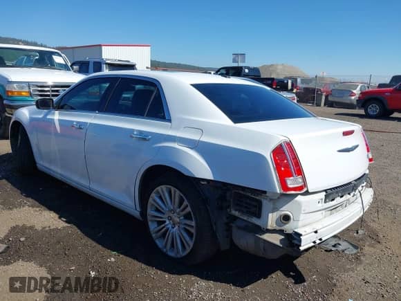 2014 Chrysler 300 C with VIN 2C3CCAEG2EH255367, listed as a IAAI auction lot 42176045 with 159,490 mi miles and . Bid and sale history available at DreamBid. Image 3.