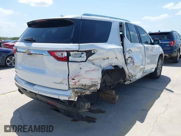 2019 Chevrolet Traverse Premier with VIN 1GNERKKW4KJ277862, listed as a IAAI auction lot 42528387 with 82,334 mi miles and . Bid and sale history available at DreamBid. Image 4.
