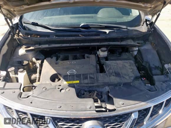 2013 Nissan Murano LE z VIN JN8AZ1MU9DW200556, wystawiony jako Copart lot #57669715 z przebiegiem 194 559 mil mil oraz Szkoda całkowita • Salvage title. Historia ofert i sprzedaży dostępna na DreamBid. Obrazek 12.