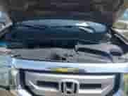 2009 Honda Pilot Touring with VIN 5FNYF38809B004142, listed as a IAAI auction lot 42337103 with 152,874 mi miles and . Bid and sale history available at DreamBid. Image 10.