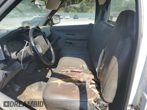 2001 Dodge 1500 Work Special z VIN 1B7HC16X01S659500, wystawiony jako Copart lot #73789034 z przebiegiem 175 338 mil mil oraz Czysty tytuł • Clean title. Historia ofert i sprzedaży dostępna na DreamBid. Obrazek 7.