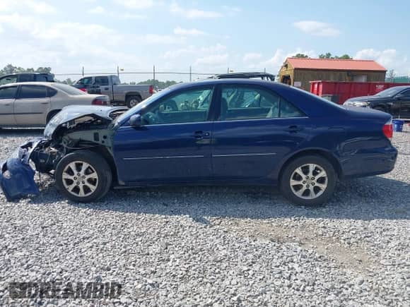 2005 Toyota Camry LE with VIN 4T1BF30K55U105946, listed as a IAAI auction lot 42567700 with Not provided miles and . Bid and sale history available at DreamBid. Image 15.