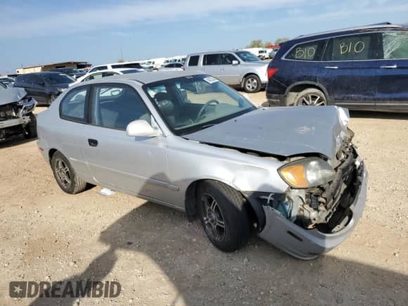 2004 Hyundai Accent GL с VIN KMHCG35C94U292013, выставлен на аукционе Copart как лот 84253364 с пробегом Не указан миль и Списание • Salvage title. История ставок и продаж доступна на DreamBid. Изображение 4.
