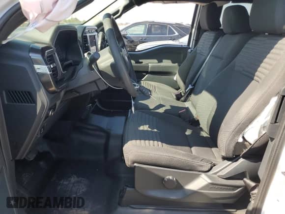 2023 Ford F-150 XL with VIN 1FTEX1EP6PKD76875, listed as a Copart auction lot 80718095 with 14,792 mi miles and Salvage title. Bid and sale history available at DreamBid. Image 7.