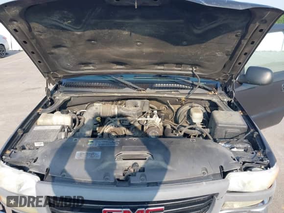 2005 GMC Sierra 1500 Work Truck z VIN 1GTEC14X05Z190508, wystawiony jako IAAI lot #42404098 z przebiegiem 169 043 mil mil oraz . Historia ofert i sprzedaży dostępna na DreamBid. Obrazek 10.