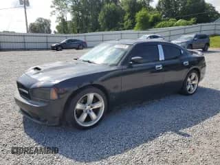2008 Dodge Charger SRT-8 с VIN 2B3LA73W18H164126, выставлен на аукционе Copart как лот 65585075 с пробегом 195 159 миль миль и Чистый • Clean title. История ставок и продаж доступна на DreamBid. Изображение 1.