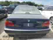 1997 BMW 7 Series 740iL with VIN WBAGJ8324VDM02317, listed as a Copart auction lot 64879564 with 107,365 mi miles and Salvage title. Bid and sale history available at DreamBid. Image 6.