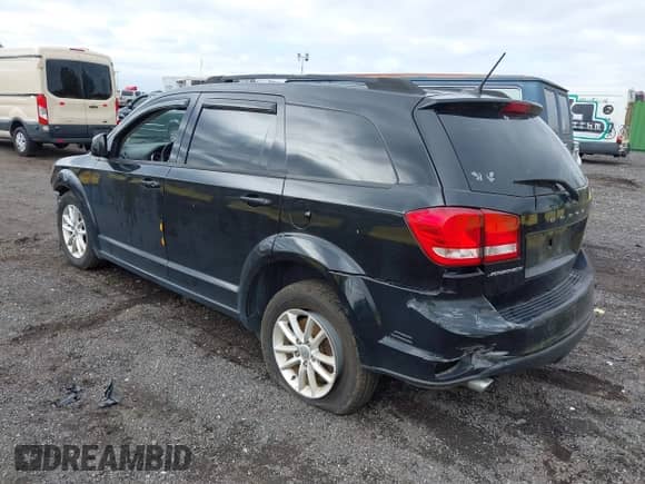 2017 Dodge Journey SXT with VIN 3C4PDCBG0HT590925, listed as a IAAI auction lot 43444981 with 99,244 mi miles and . Bid and sale history available at DreamBid. Image 3.