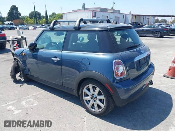 2011 MINI Hardtop with VIN WMWSU3C56BT183361, listed as a IAAI auction lot 42489436 with 106,377 mi miles and . Bid and sale history available at DreamBid. Image 3.