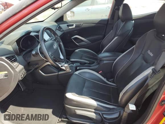 2013 Hyundai Veloster Turbo с VIN KMHTC6AE4DU106074, выставлен на аукционе Copart как лот 67664655 с пробегом 40 812 миль миль и Списание • Salvage title. История ставок и продаж доступна на DreamBid. Изображение 7.