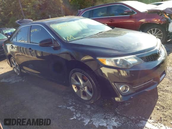 2014 Toyota Camry SE with VIN 4T1BF1FK7EU422297, listed as a IAAI auction lot 43391684 with 141,092 mi miles and . Bid and sale history available at DreamBid. Image 1.