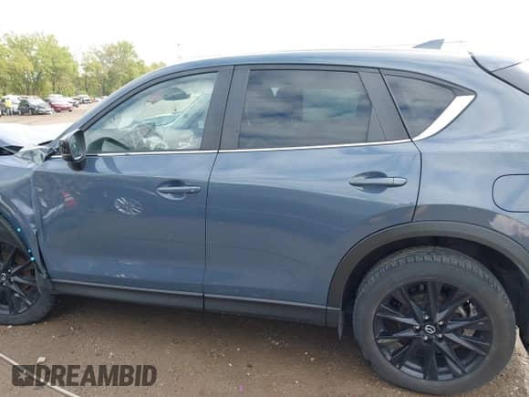 2023 Mazda CX-5 S Carbon Edition с VIN JM3KFBCM9P0167900, выставлен на аукционе IAAI как лот 43291236 с пробегом 40 306 миль миль и . История ставок и продаж доступна на DreamBid. Изображение 14.