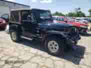 1999 Jeep Wrangler Sahara с VIN 1J4FY49S6XP432277, выставлен на аукционе Copart как лот 61622585 с пробегом 113 390 миль миль и Списание • Salvage title. История ставок и продаж доступна на DreamBid. Изображение 4.