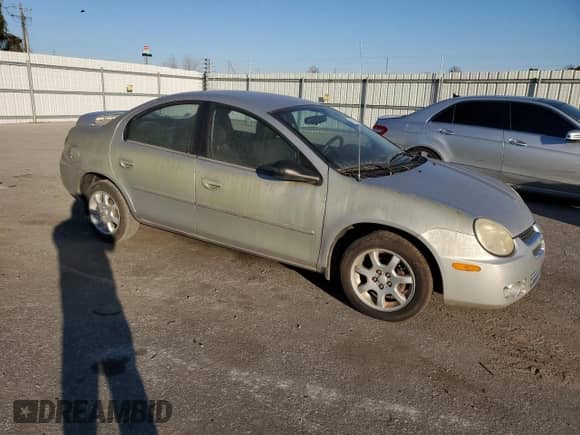 2004 Dodge Neon SXT z VIN 1B3ES56C14D575612, wystawiony jako Copart lot #89182985 z przebiegiem 33 100 mil mil oraz Czysty tytuł • Clean title. Historia ofert i sprzedaży dostępna na DreamBid. Obrazek 4.