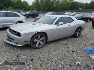 2008 Dodge Challenger SRT-8 with VIN 2B3LJ74W88H300914, listed as a Copart auction lot 60229225 with 74,906 mi miles and Salvage title. Bid and sale history available at DreamBid. Image 1.