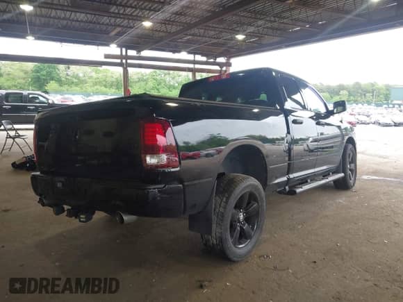 2014 Ram 1500 Tradesman with VIN 1C6RR7FT0ES215646, listed as a IAAI auction lot 42367423 with 132,861 mi miles and . Bid and sale history available at DreamBid. Image 4.