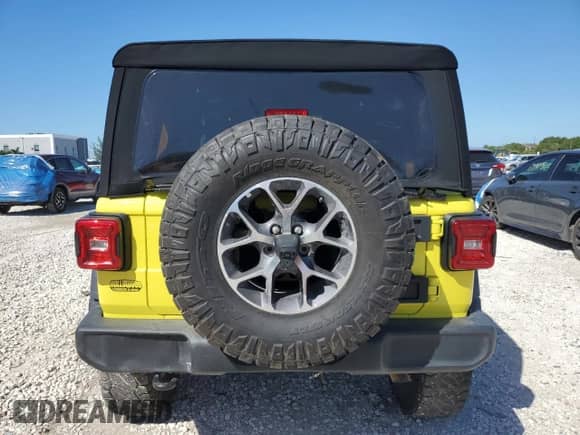 2024 Jeep Wrangler Willys with VIN 1C4RJXDNXRW124418, listed as a Copart auction lot 84255475 with 8,801 mi miles and Non repairable. Bid and sale history available at DreamBid. Image 6.