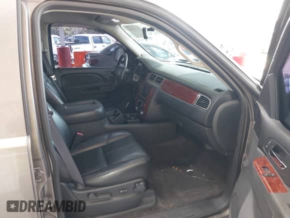 2012 Chevrolet Tahoe LT with VIN 1GNSCBE05CR132201, listed as a IAAI auction lot 42671016 with 219,625 mi miles and . Bid and sale history available at DreamBid. Image 5.