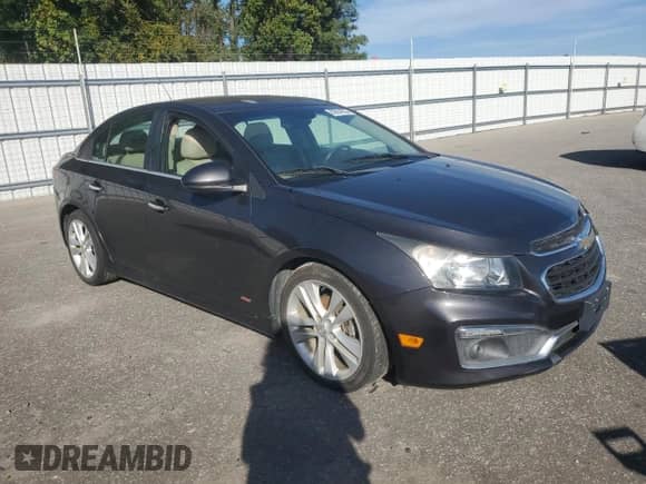 2015 Chevrolet Cruze LTZ with VIN 1G1PG5SB6F7110582, listed as a Copart auction lot 82654535 with 136,446 mi miles and Clean title. Bid and sale history available at DreamBid. Image 4.