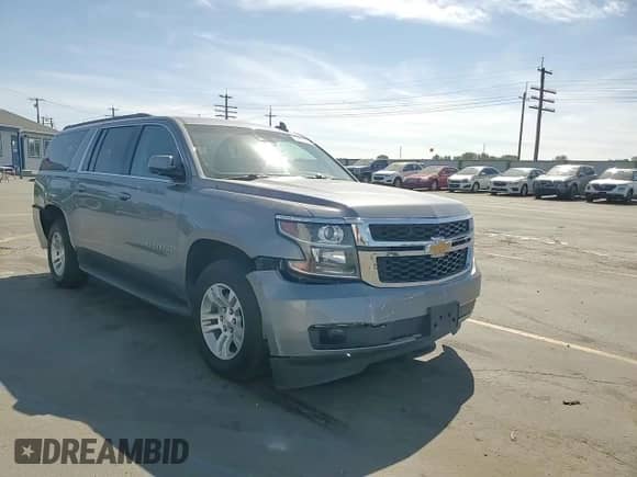 2018 Chevrolet Suburban LT z VIN 1GNSKHKC1JR363632, wystawiony jako Copart lot #81511555 z przebiegiem 102 225 mil mil oraz Szkoda całkowita • Salvage title. Historia ofert i sprzedaży dostępna na DreamBid. Obrazek 14.