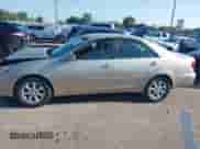 2005 Toyota Camry STD with VIN 4T1BE32KX5U084110, listed as a IAAI auction lot 43162822 with 210,556 mi miles and . Bid and sale history available at DreamBid. Image 13.