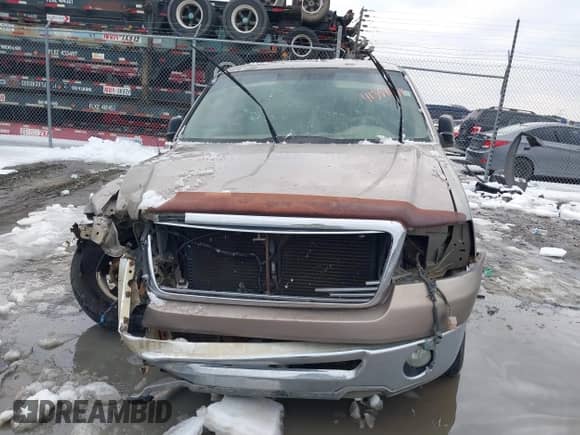 2005 Ford F-150 STX with VIN 1FTRX12W25NA07049, listed as a IAAI auction lot 41354644 with 338,811 mi miles and . Bid and sale history available at DreamBid. Image 12.