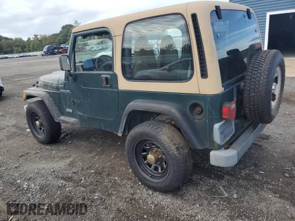 2000 Jeep Wrangler SE with VIN 1J4FA29P8YP735101, listed as a Copart auction lot 81805125 with Not provided miles and Clean title. Bid and sale history available at DreamBid. Image 2.