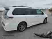 2014 Toyota Sienna SE with VIN 5TDXK3DCXES431576, listed as a Copart auction lot 69655795 with 221,877 mi miles and Salvage title. Bid and sale history available at DreamBid. Image 3.