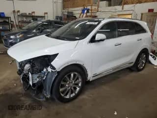 2016 Kia Sorento SXL z VIN 5XYPKDA50GG086151, wystawiony jako Copart lot #71834295 z przebiegiem 165 638 mil mil oraz Szkoda całkowita • Salvage title. Historia ofert i sprzedaży dostępna na DreamBid. Obrazek 1.