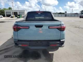 2024 Hyundai Santa Cruz SE z VIN 5NTJA4AE3RH083184, wystawiony jako Copart lot #90419595 z przebiegiem 21 588 mil mil oraz Szkoda całkowita • Salvage title. Historia ofert i sprzedaży dostępna na DreamBid. Obrazek 6.