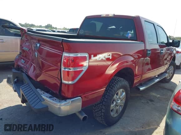 2013 Ford F-150 Lariat with VIN 1FTFW1ET5DKD59128, listed as a IAAI auction lot 43185916 with 135,162 mi miles and . Bid and sale history available at DreamBid. Image 4.