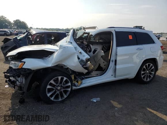 2018 Jeep Grand Cherokee Overland z VIN 1C4RJFCG2JC503559, wystawiony jako Copart lot #65679805 z przebiegiem Nie podano mil oraz Szkoda całkowita • Salvage title. Historia ofert i sprzedaży dostępna na DreamBid. Obrazek 1.