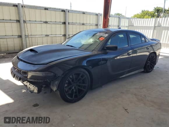 2013 Dodge Charger SRT-8 с VIN 2C3CDXEJ5DH597566, выставлен на аукционе Copart как лот 89835925 с пробегом 79 370 миль миль и Списание • Salvage title. История ставок и продаж доступна на DreamBid. Изображение 1.