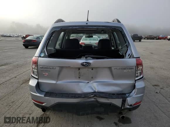 2013 Subaru Forester X z VIN JF2SHABC0DH413379, wystawiony jako Copart lot #81877155 z przebiegiem 165 562 mil mil oraz Szkoda całkowita • Salvage title. Historia ofert i sprzedaży dostępna na DreamBid. Obrazek 6.