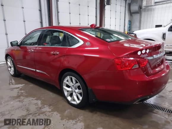 2014 Chevrolet Impala LTZ with VIN 1G1145SL2EU100560, listed as a IAAI auction lot 42278585 with 216,097 mi miles and . Bid and sale history available at DreamBid. Image 3.