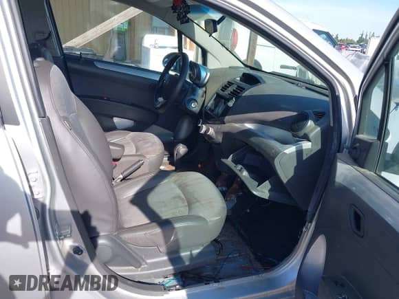 2014 Chevrolet Spark LS with VIN KL8CB6S95EC453597, listed as a IAAI auction lot 42454469 with 104,181 mi miles and . Bid and sale history available at DreamBid. Image 5.
