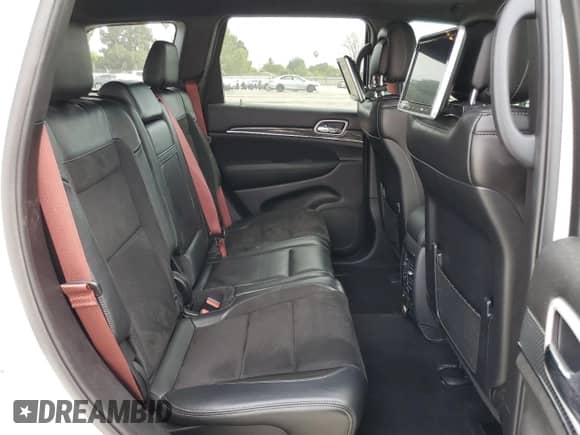 2020 Jeep Grand Cherokee SRT with VIN 1C4RJFDJ1LC366188, listed as a Copart auction lot 55695765 with 35,302 mi miles and Salvage title. Bid and sale history available at DreamBid. Image 11.