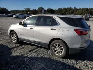 2020 Chevrolet Equinox LT z VIN 2GNAXKEV8L6118784, wystawiony jako Copart lot #87294485 z przebiegiem 143 762 mil mil oraz Czysty tytuł • Clean title. Historia ofert i sprzedaży dostępna na DreamBid. Obrazek 2.