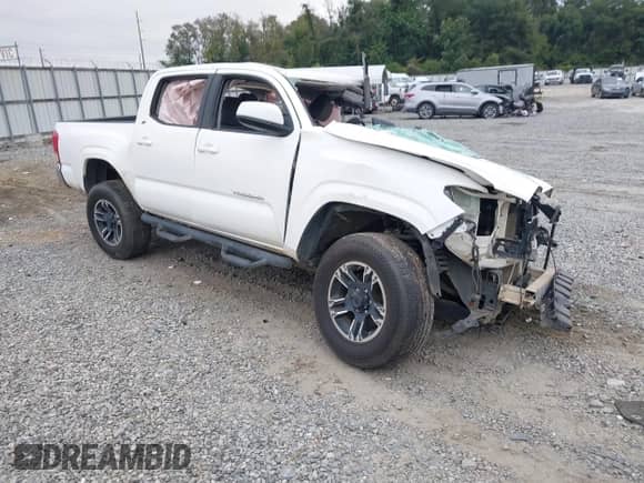2016 Toyota Tacoma TRD Off Road with VIN 3TMAZ5CN1GM006167, listed as a IAAI auction lot 43133468 with Not provided miles and . Bid and sale history available at DreamBid. Image 1.