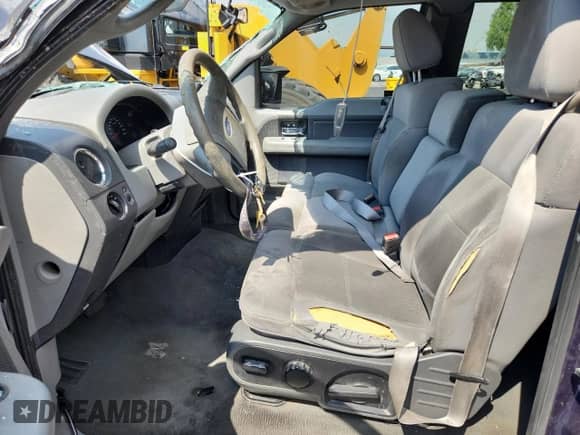 2005 Ford F-150 XLT with VIN 1FTPX14595NB53220, listed as a Copart auction lot 67708905 with 179,175 mi miles and Salvage title. Bid and sale history available at DreamBid. Image 7.