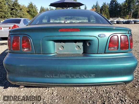 1996 Ford Mustang z VIN 1FALP4049TF223504, wystawiony jako Copart lot #86594685 z przebiegiem 191 404 mil mil oraz Szkoda całkowita • Salvage title. Historia ofert i sprzedaży dostępna na DreamBid. Obrazek 6.