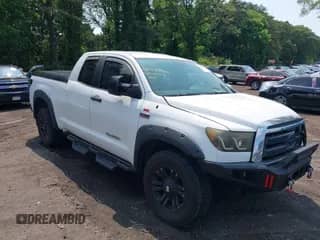 2010 Toyota Tundra with VIN 5TFUY5F16AX144667, listed as a IAAI auction lot 42447606 with 269,700 mi miles and . Bid and sale history available at DreamBid. Image 1.