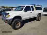 1997 Toyota Tacoma with VIN 4TAWN72N1VZ242680, listed as a Copart auction lot 85537735 with 218,563 mi miles and Clean title. Bid and sale history available at DreamBid. Image 1.