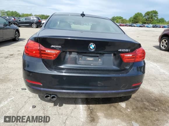 2016 BMW 4 Series 428i xDrive with VIN WBA3N9C5XGK248486, listed as a Copart auction lot 55424345 with 124,123 mi miles and Salvage title. Bid and sale history available at DreamBid. Image 6.