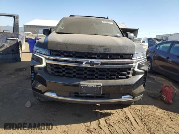 2021 Chevrolet Tahoe with VIN 1GNSKMKT8MR355007, listed as a Copart auction lot 76082323 with 48,498 mi miles and . Bid and sale history available at DreamBid. Image 5.