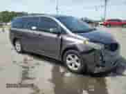 2014 Toyota Sienna LE AAS with VIN 5TDKK3DCXES437212, listed as a Copart auction lot 70334955 with 267,885 mi miles and Salvage title. Bid and sale history available at DreamBid. Image 4.