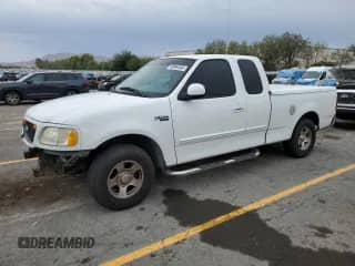 2000 Ford F-150 XL z VIN 1FTZX1723YNA22380, wystawiony jako Copart lot #69984065 z przebiegiem 173 201 mil mil oraz Szkoda całkowita • Salvage title. Historia ofert i sprzedaży dostępna na DreamBid. Obrazek 1.