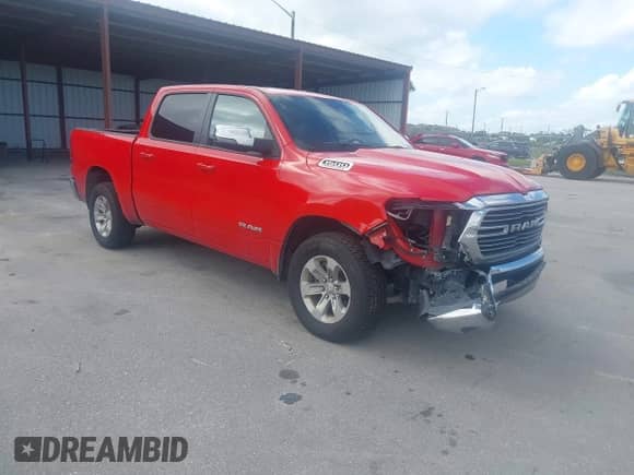 2024 Ram 1500 Laramie with VIN 1C6RREJT1RN219379, listed as a IAAI auction lot 43495052 with 60,616 mi miles and . Bid and sale history available at DreamBid. Image 1.