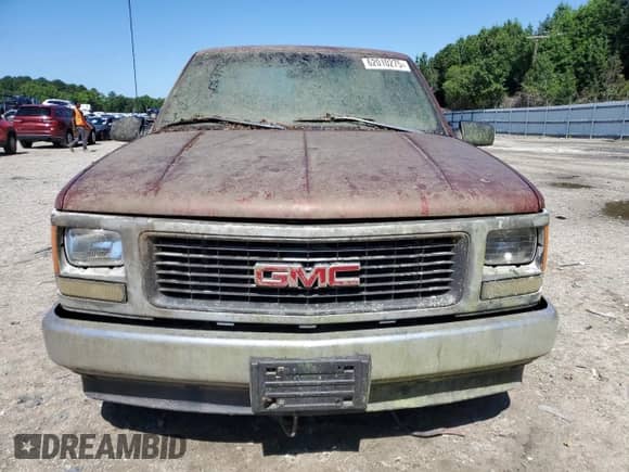 1998 GMC Sierra 1500 z VIN 1GTEC14W2WZ550452, wystawiony jako Copart lot #62010275 z przebiegiem 214 269 mil mil oraz Czysty tytuł • Clean title. Historia ofert i sprzedaży dostępna na DreamBid. Obrazek 5.
